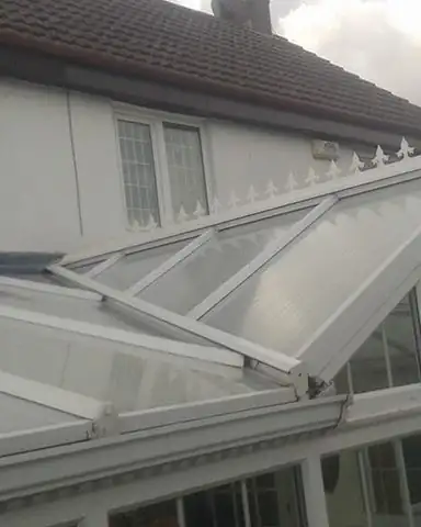 After: the conservatory roof clean and bright.
