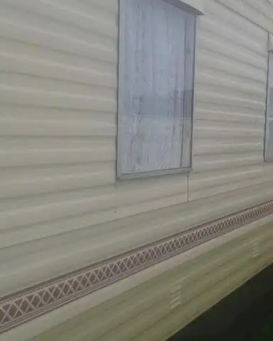 After: the caravan's cream panels clean.